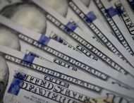 Нацбанк понизил справочный курс доллара