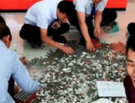 Китаянка розплатилася за автомобіль 66-ма мішками монет (відео)